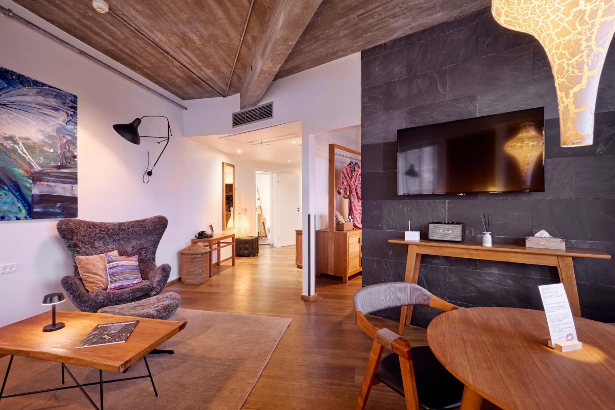 마농 레 스위트 굴스메덴 호텔 코펜하겐 외부 사진 The interior of a suite at the Hotel