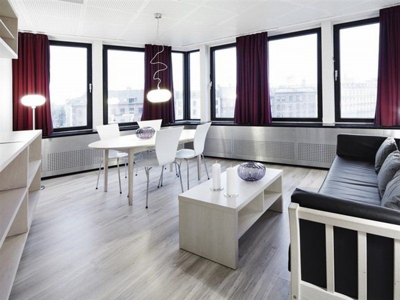 마농 레 스위트 굴스메덴 호텔 코펜하겐 외부 사진 Interior of a serviced apartment in Berlin, Germany
